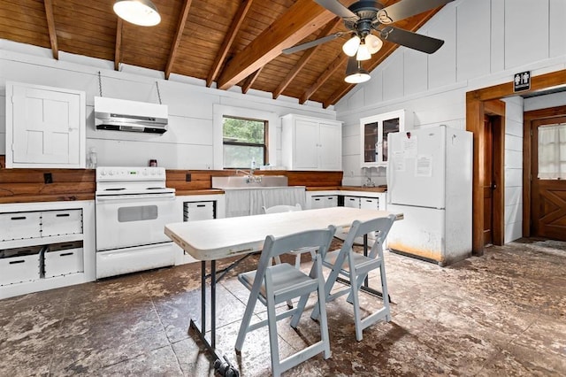 kitchen featuring white appliances, white cabinets, ceiling fan, beamed ceiling, and extractor fan