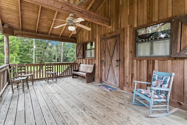 wooden deck with ceiling fan