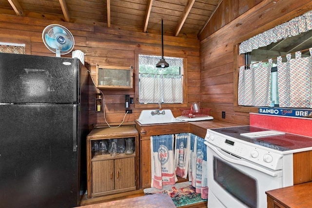 kitchen featuring black fridge, white electric range, hanging light fixtures, vaulted ceiling with beams, and wood ceiling