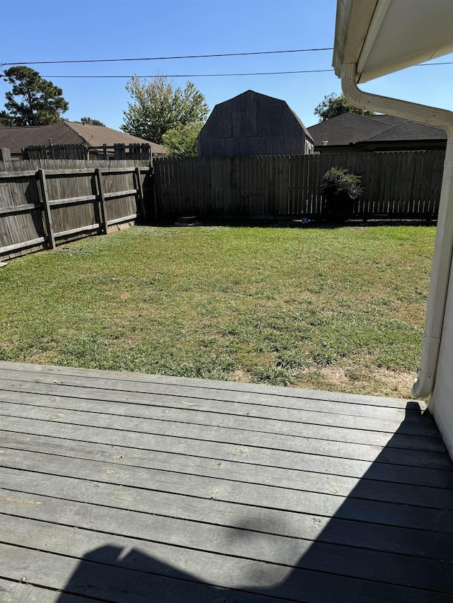 deck featuring a yard