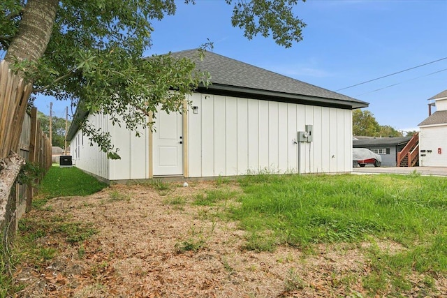 view of side of home featuring central air condition unit