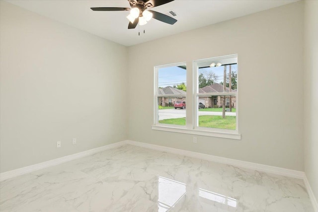 unfurnished room featuring ceiling fan