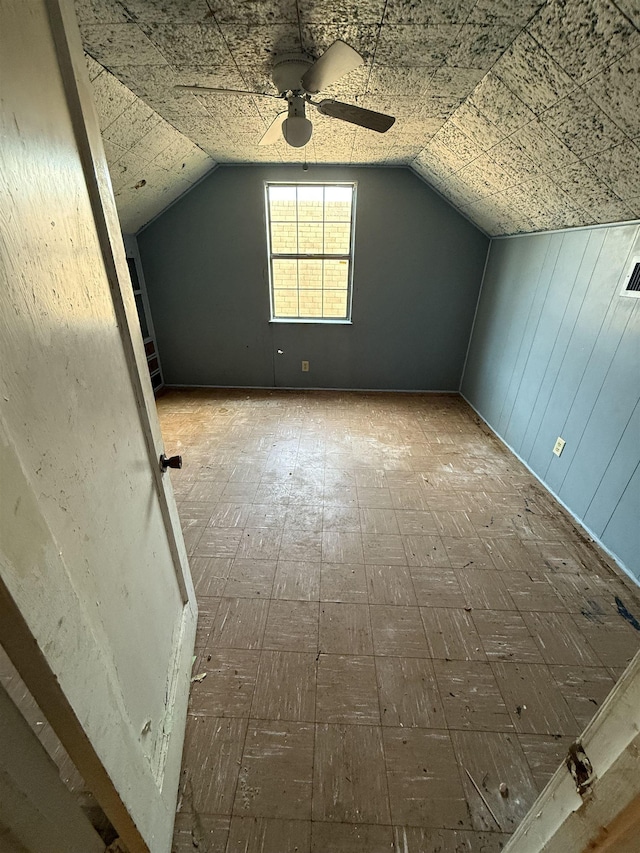 bonus room featuring ceiling fan and vaulted ceiling