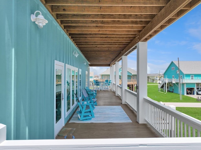 wooden deck featuring a residential view