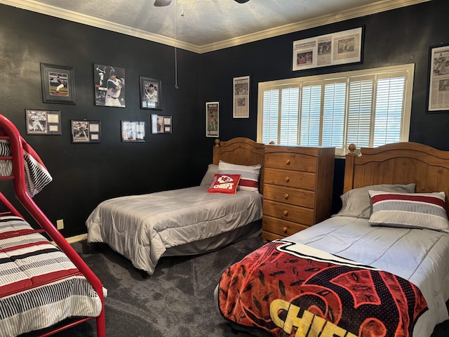 carpeted bedroom featuring ceiling fan and ornamental molding