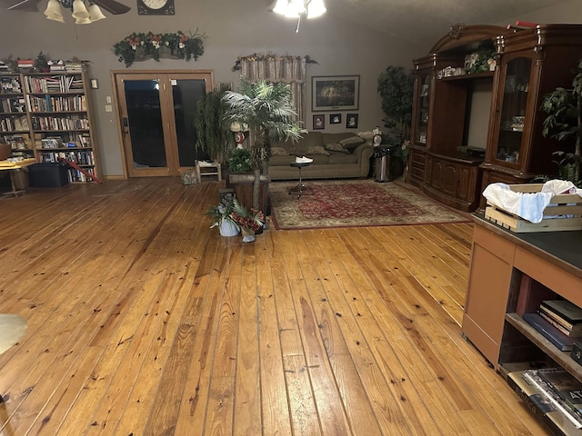 interior space with ceiling fan and light hardwood / wood-style floors