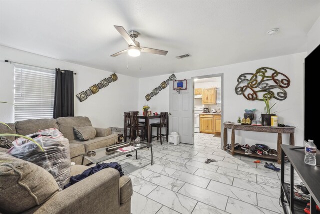2725 29th St, Port Arthur, TX 77640 - living room with light marble finish flooring and ceiling fan