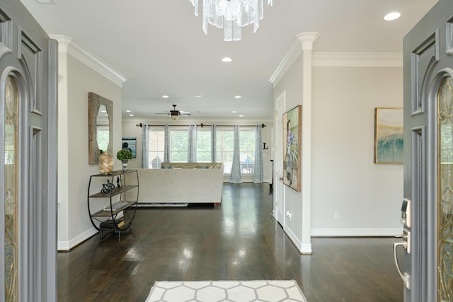 2250 Savannah Trce, Beaumont, TX 77706 - entryway with ceiling fan, dark wood-type flooring, crown molding, recessed lighting, and a chandelier