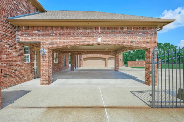 2250 Savannah Trce, Beaumont, TX 77706 - view of patio / terrace featuring driveway