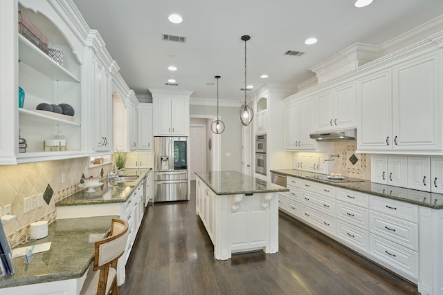 2250 Savannah Trce, Beaumont, TX 77706 - kitchen featuring stainless steel appliances, under cabinet range hood, white cabinets, backsplash, and open shelves