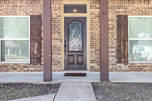 12715 Koawood Ln, Beaumont, TX 77713 - entrance to property featuring brick siding and covered porch