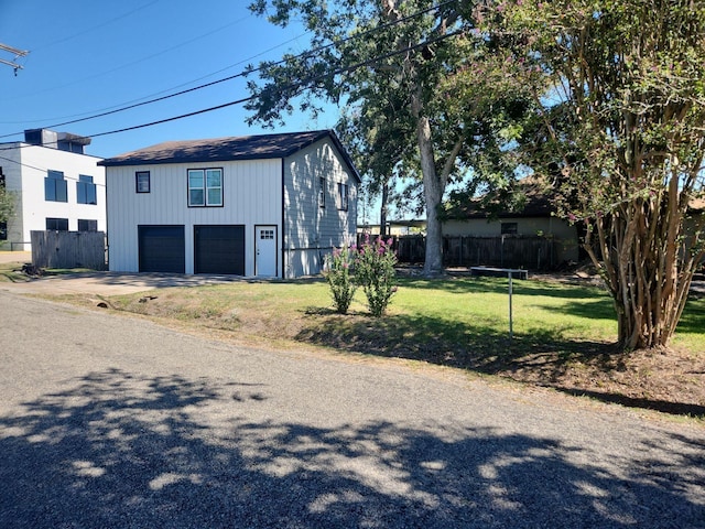 1313 Block St, Port Neches, TX 77651 - view of side of home with driveway