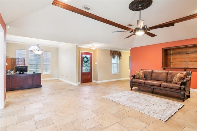 living room with lofted ceiling, ceiling fan, and ornamental molding