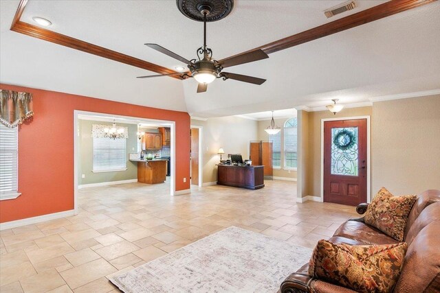 living room with ceiling fan with notable chandelier, vaulted ceiling, and ornamental molding