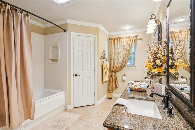 bathroom featuring shower / bath combination with curtain, a textured ceiling, vanity, crown molding, and tile patterned flooring