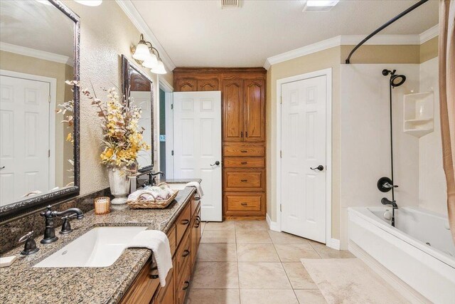 bathroom with tile patterned floors, shower / washtub combination, vanity, and ornamental molding