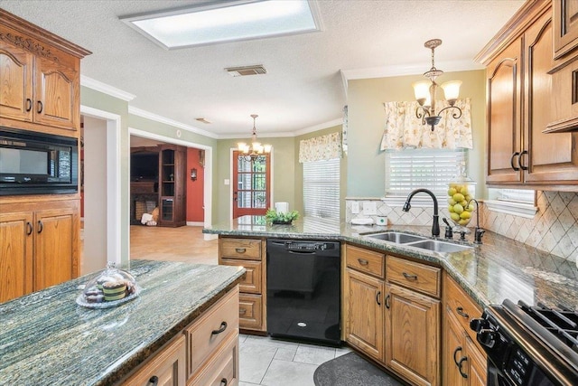 kitchen with light tile patterned floors, sink, an inviting chandelier, and black appliances