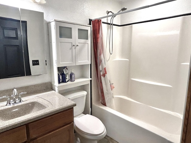 full bathroom with vanity,  shower combination, and toilet