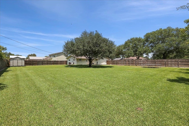 233 Spooner St, Orange, TX 77630 - view of yard featuring a storage shed and an outdoor structure