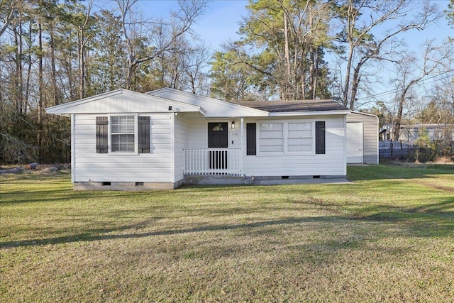 view of front of home with crawl space and a front lawn