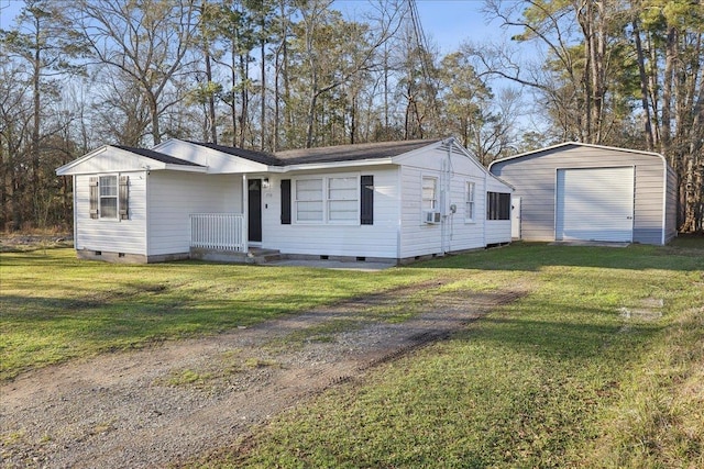 view of front of house with crawl space, a front lawn, cooling unit, and an outdoor structure