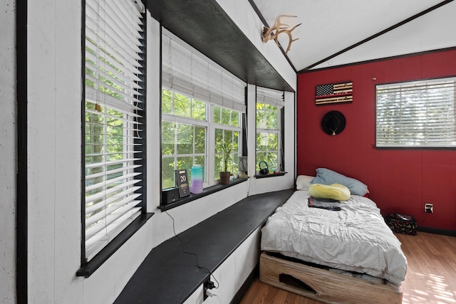 7775 River Rd, Beaumont, TX 77713 - bedroom featuring lofted ceiling and wood finished floors