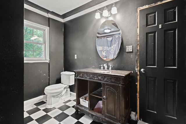 7775 River Rd, Beaumont, TX 77713 - bathroom with tile patterned floors, vanity, a textured wall, and ornamental molding