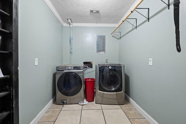 7775 River Rd, Beaumont, TX 77713 - washroom with independent washer and dryer, crown molding, a textured ceiling, tile patterned floors, and electric panel