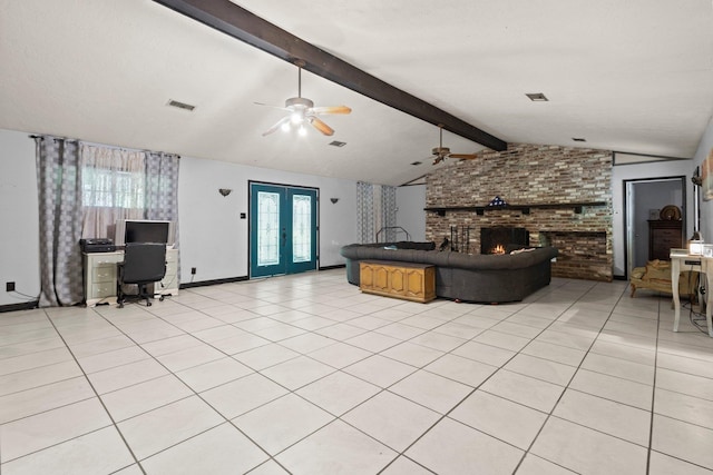 7775 River Rd, Beaumont, TX 77713 - living area featuring ceiling fan, a fireplace, light tile patterned floors, and a desk
