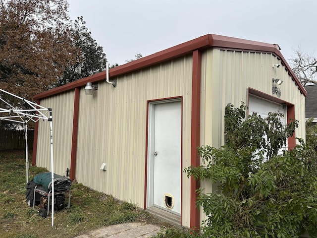 view of outbuilding featuring a garage