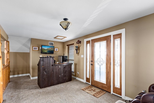 entryway with carpet