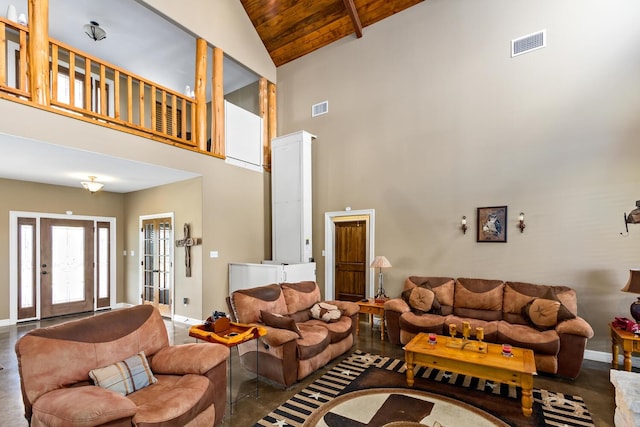 living room with beamed ceiling, high vaulted ceiling, wooden ceiling, and concrete floors