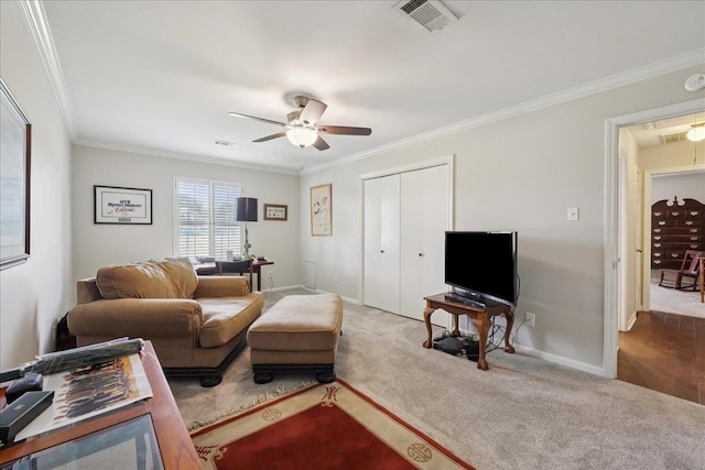 6650 Windwood Ln, Beaumont, TX 77706 - carpeted living room with attic access, ornamental molding, a ceiling fan, and baseboards