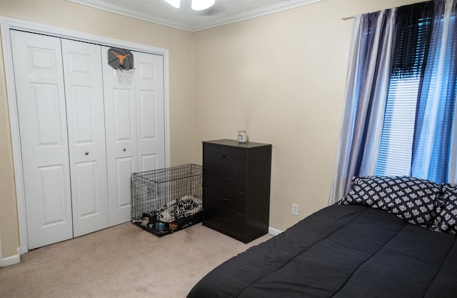 269 E Chance Rd, Lumberton, TX 77657 - bedroom featuring ornamental molding, carpet, a closet, and baseboards