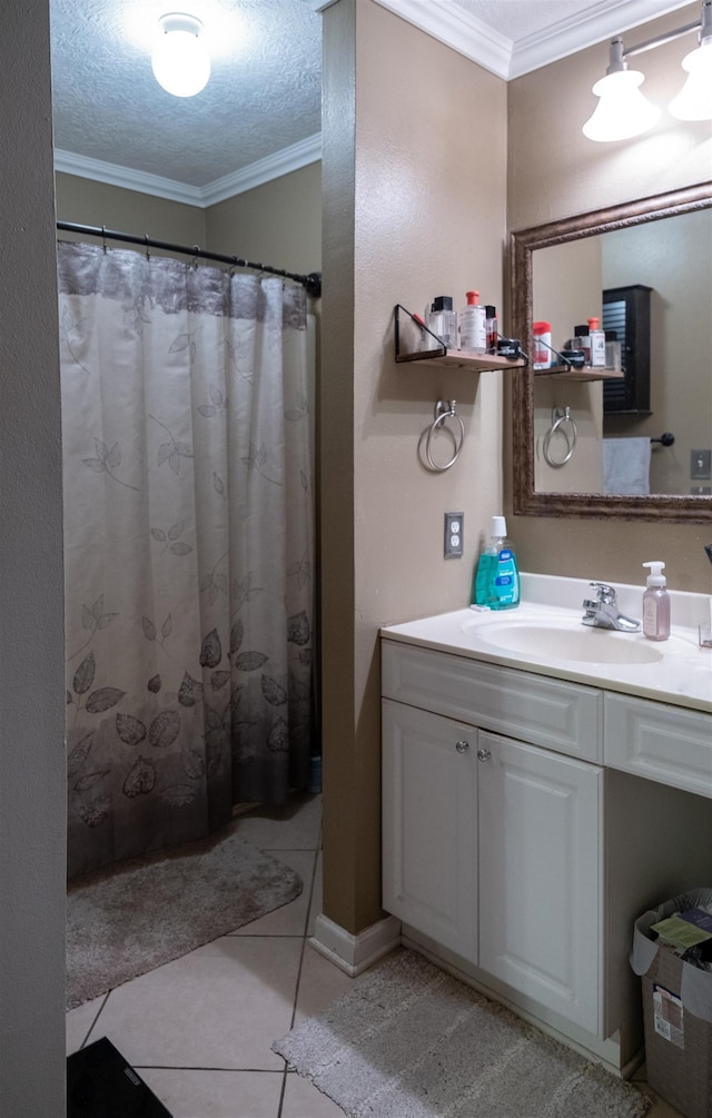 269 E Chance Rd, Lumberton, TX 77657 - full bathroom featuring ornamental molding, vanity, and tile patterned floors
