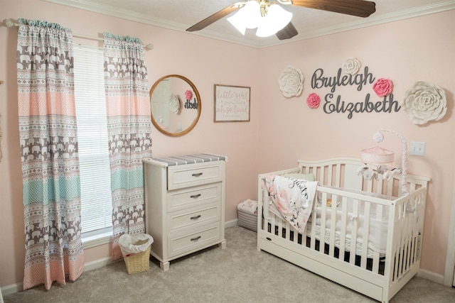 269 E Chance Rd, Lumberton, TX 77657 - bedroom with light colored carpet, a nursery area, crown molding, baseboards, and a ceiling fan