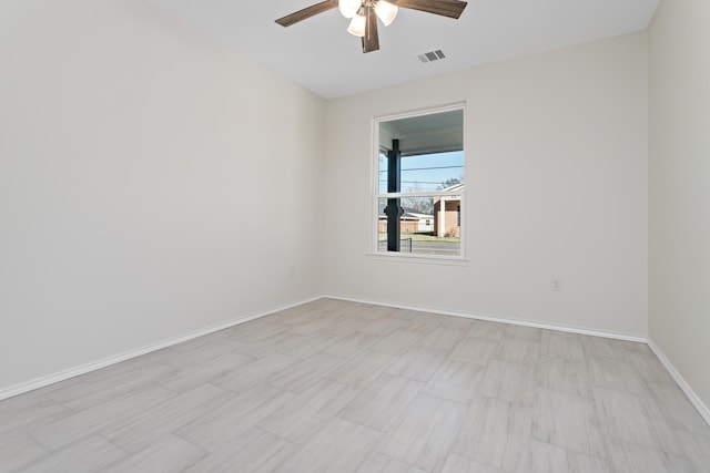 spare room featuring ceiling fan