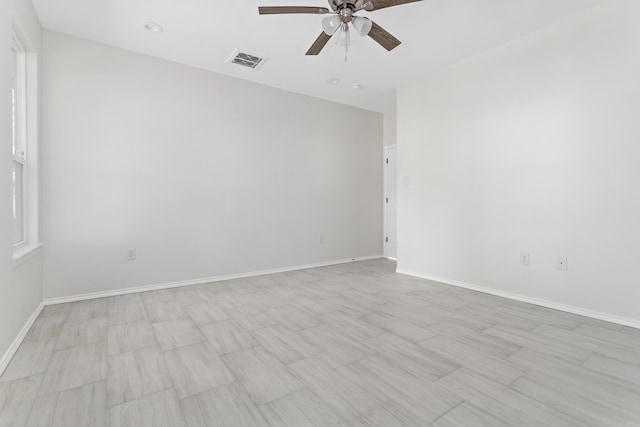 spare room featuring ceiling fan