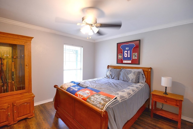 bedroom featuring ceiling fan, dark hardwood / wood-style flooring, and crown molding