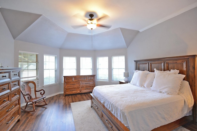 bedroom with dark hardwood / wood-style floors, ceiling fan, and ornamental molding