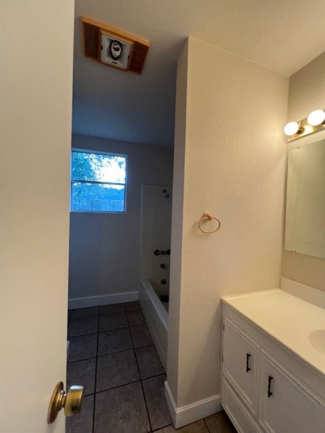 bathroom with vanity and tile patterned floors