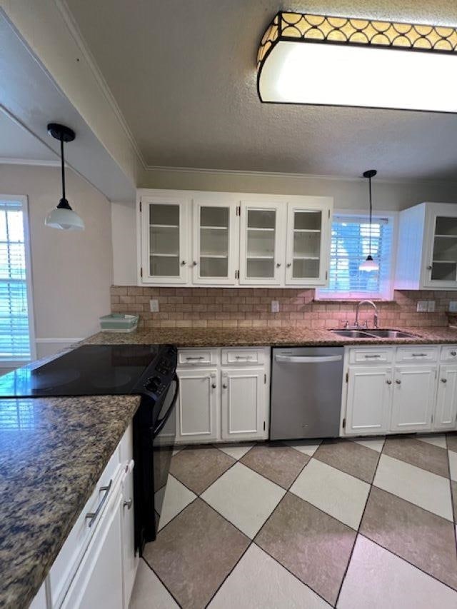 kitchen featuring pendant lighting, sink, white cabinetry, black / electric stove, and stainless steel dishwasher