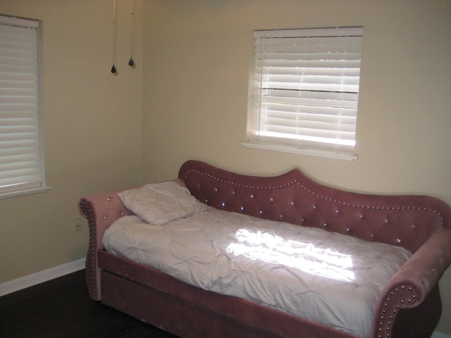 100 Cypress Bnd, Village Mills, TX 77663 - bedroom with wood finished floors and baseboards