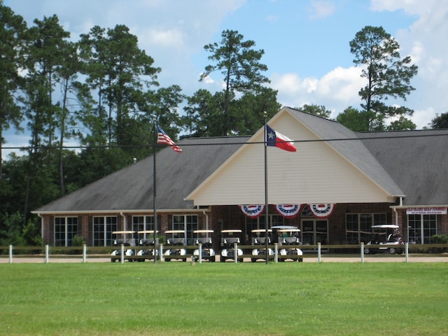 100 Cypress Bnd, Village Mills, TX 77663 - view of community featuring a lawn