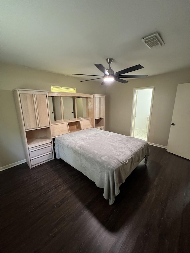 100 Cypress Bnd, Village Mills, TX 77663 - bedroom featuring dark wood-style floors and a ceiling fan
