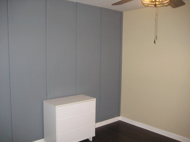 100 Cypress Bnd, Village Mills, TX 77663 - unfurnished room with ceiling fan and dark wood-style flooring