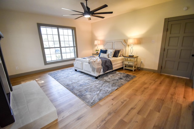 bedroom featuring ceiling fan and light wood-type flooring