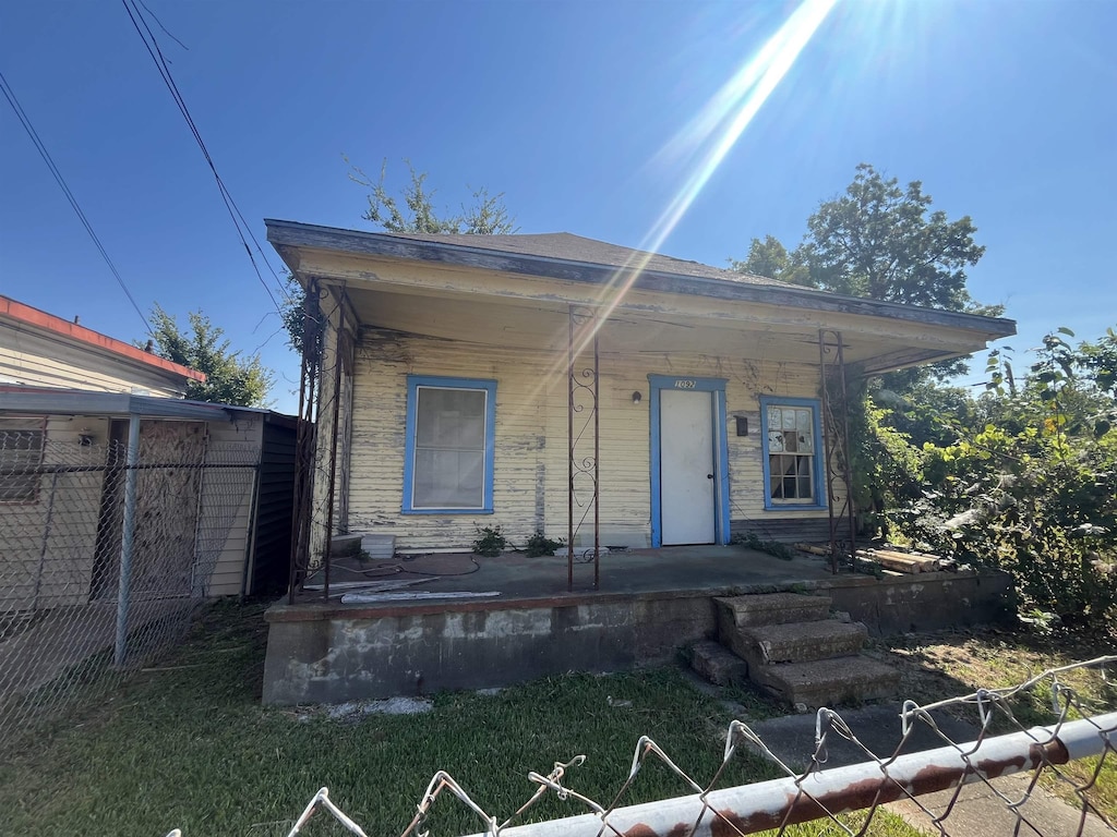 bungalow-style home with a porch