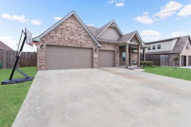 view of front of property featuring a garage and a front yard