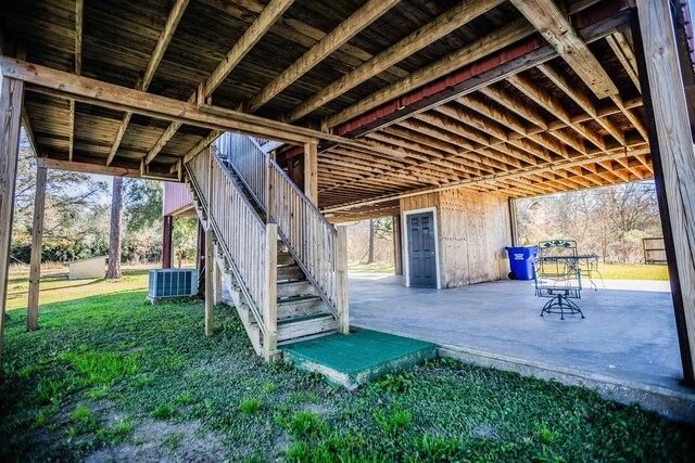 view of outbuilding with a lawn